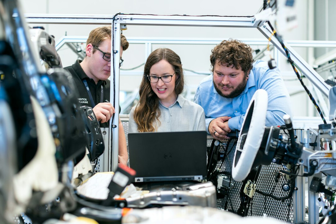 diverse group in coding workshop