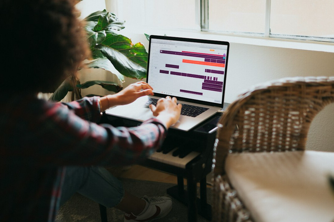 man learning programming at home